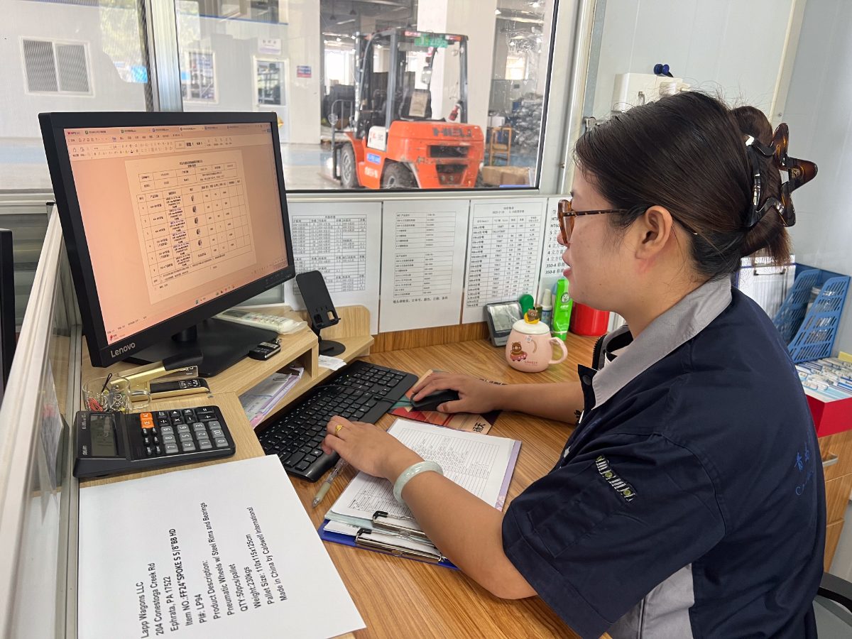 Engineer working on part drawings